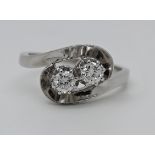 1 Damenring WG 14ct. mit 2 Brillanten je ca. 0,22ct. je ca. D 4mm, hell/wohl gute Qualität Ringgröße