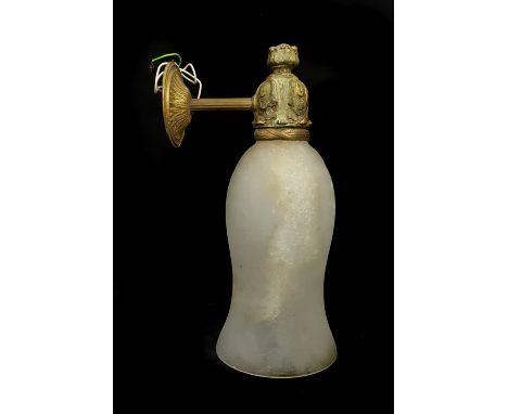 A cast brass wall light bracket formed as a anthemion bud and leaves with frosted glass shade, 30cmmax