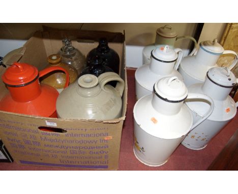 A large collection of assorts enamel glass and stoneware jars etc