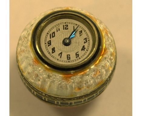 An early 20th century Swiss cylinder silver gilt and guilloche enamel ball pendant watch, having unsigned silver dial, the ca