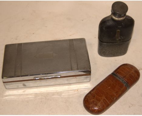 A late Victorian leather clad and silver plated hip flask together with one other leather covered hip flask and a silver plat