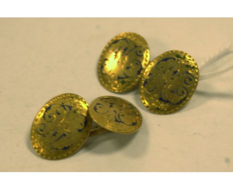 A pair of yellow metal and enamel set gents cufflinks, marks worn, with enamel losses, 11.8g