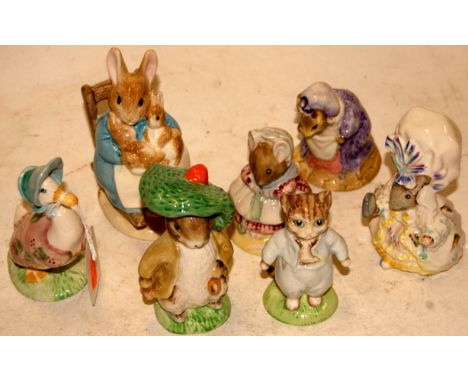 A collection of seven Royal Albert Beatrix Potter figures to include Jemima Puddleduck, Tom Kitten, Benjamin Bunny, Mrs Rabbi