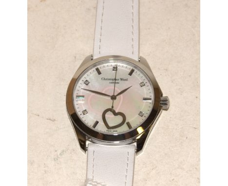A ladies Christopher Ward steel cased wristwatch, having mother of pearl dial with baton markers, on a white leather strap