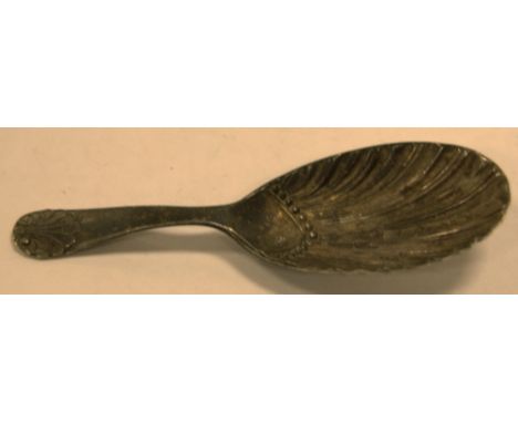 A George V silver caddy spoon, having shell embossed bowl, Sheffield 1915