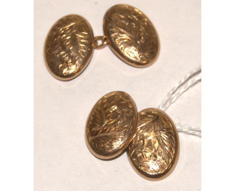 A pair of 9ct gold and engraved cufflinks, 3.5g