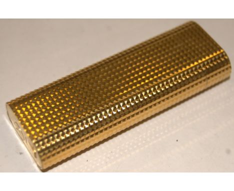 A boxed Le Must de Cartier pocket cigarette lighter, with supporting paperwork 