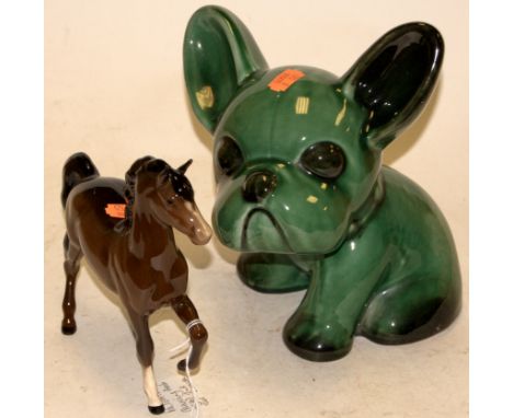 A Beswick model of a Palomino (Prancing Arab type,) second version No. 1261, together with a Bourne Denby green glazed model 