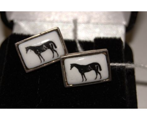 A pair of modern silver and porcelain inset cufflinks