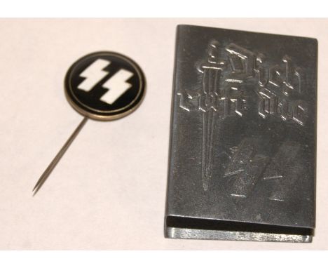 A reproduction German SS matchbox holder  together with a reproduction German enamel SS lapel pin