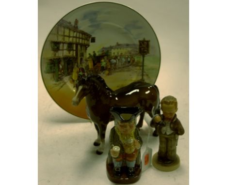 A Royal Doulton Old English Coaching Scenes series ware plate D6393 together with a Royal Doulton Toby jug, a Beswick model o