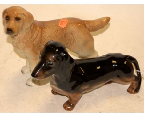 A Beswick model of a dalmatian standing No. 3103 black & tan gloss finish together with a Coopercraft model of retriever (2)