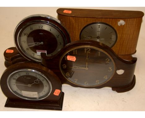 A 1930s oak cased Metamec electric mantel clock, having silvered dial with Arabic numerals; together with three other 1930s/4