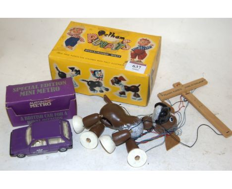 A boxed Pelham Standard A7 Bengo puppet; together with a Corgi Special Edition Mini Metro, boxed (2)