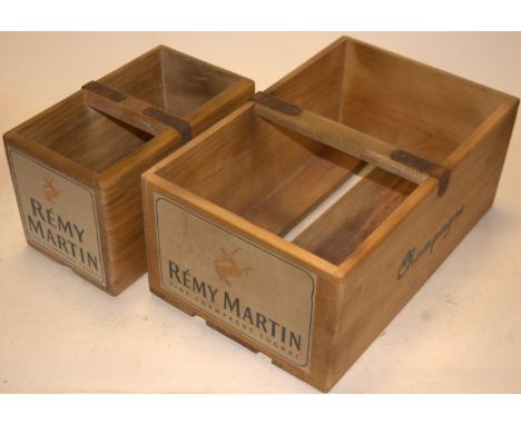 A set of four hardwood crates, each bearing a label for Remy Martin champagne cognac