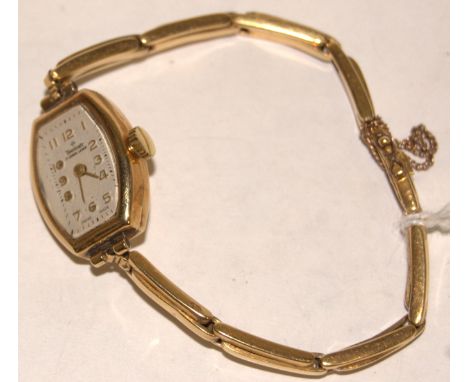 A Yeoman 18ct gold cased ladies cocktail watch having signed white dial, manual wind movement  and on expanding bracelet, gro