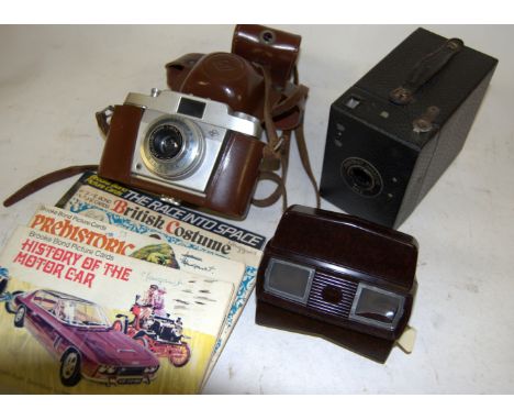 A collection of miscellaneous items to include; a Viewmaster 3D viewer, a portrait Hawkeye No.2 camera, Brooke Bond picture c