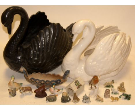 A Goebel figural vase, in the form of a white swan; together with a Dartmouth Pottery example; and various animal figures etc
