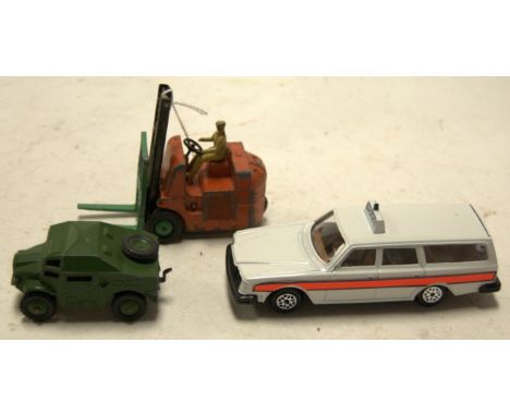 A Dinky Toys diecast model of a Coventry Climax forklift truck; together with one other Dinky Toys field artillery tractor; a