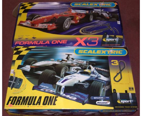 A boxed Scalextric Formula 1 McLaren Mercedes set together with one other Formula 1 X3 set 