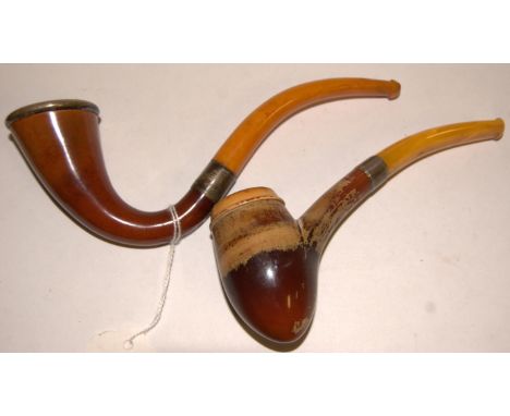 An Edwardian amber and silver mounted pipe in fitted leather case together with one other cased silver mounted pipe (2)