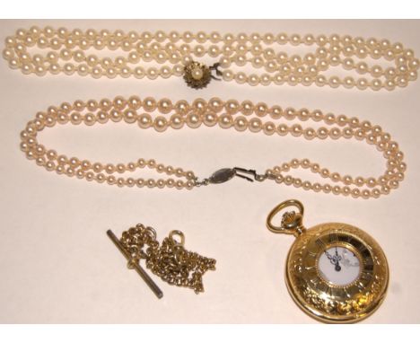 A double strand simulated pearl choker having a silver clasp, boxed, together with one other similar, and a modern Jean Pierr