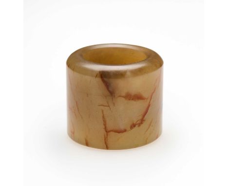 A CHINESE JADE ARCHER’S RING, QING DYNASTY, 18TH/19TH CENTURY of brown-white jade with some figured pattern, of characteristi