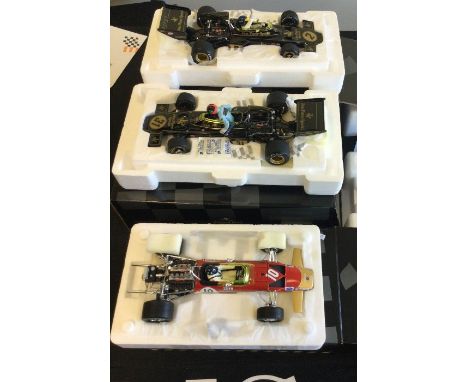 RACING LEGENDS: Three various 1:18 scale Lotus boxed model racing cars. Est. £40 - £60.