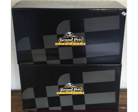 RACING LEGENDS: Two various 1:18 scale Renault boxed model racing cars. Est. £40 - £60.