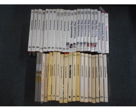 BOOKS: AUTOMOBILE YEAR Vol.5 (1958), 6 (not shown in photograph),11-12, 14-24, 26, 27, 29, 30, 31, (not shown in photo), 32, 