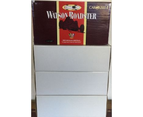 CAROUSEL: Three various 1:18 scale Watson Roadster boxed model racing cars. Est. £40 - £60.