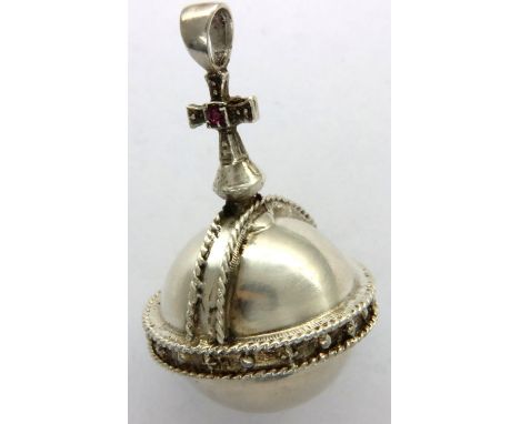 Hallmarked silver orb pendant set with a single ruby, in the Vivienne Westwood style, H: 40 mm, 18g. P&amp;P Group 1 (£14+VAT
