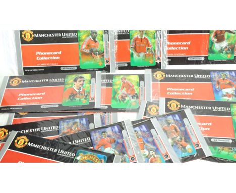Eighteen Manchester United unopened BT phone cards. P&amp;P Group 1 (£14+VAT for the first lot and £1+VAT for subsequent lots