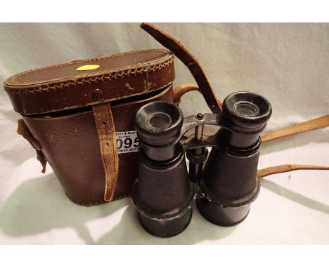 Pair of  leather cased British made binoculars. P&amp;P Group 2 (£18+VAT for the first lot and £3+VAT for subsequent lots) 