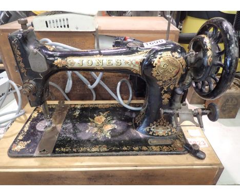 Jones sewing machine in wooden case. Not available for in-house P&amp;P, contact Paul O'Hea at Mailboxes on 01925 659133
Cond