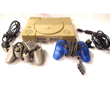 Sony Playstation console, with power lead and two controllers. P&amp;P Group 1 (£14+VAT for the first lot and £1+VAT for subs