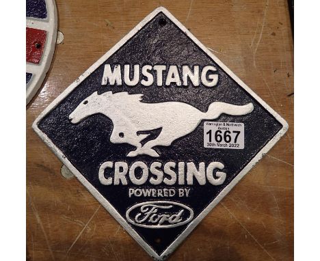 Cast iron blue Mustang Crossing sign. P&amp;P Group 2 (£18+VAT for the first lot and £3+VAT for subsequent lots) 