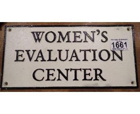 Cast iron Womens Evaluation sign. P&amp;P Group 2 (£18+VAT for the first lot and £3+VAT for subsequent lots) 