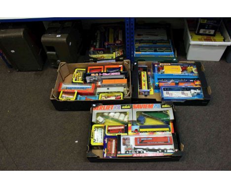 Five boxes of Corgi, Matchbox and other toy trucks