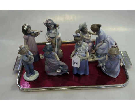 Collection of seven Nao figures, children playing music and others