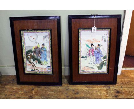 Pair framed Oriental ceramic plaques depicting figures in gardens, plaques 35cm by 23cm
