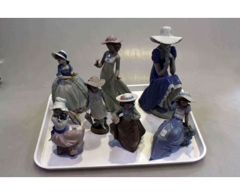 Collection of seven Nao figures