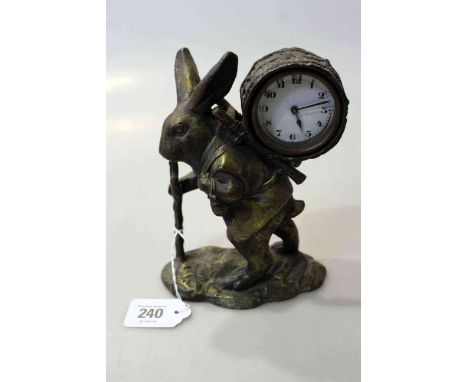 Bronze novelty clock in the form of a travelling rabbit carrying time on his back, 18.5cm