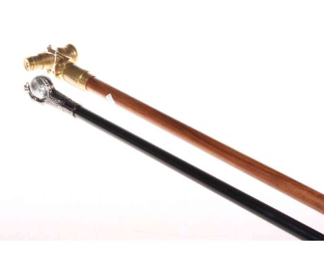 Telescopic wood and brass walking stick, also a ball and claw walking stick