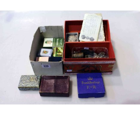 Two boxes with coins and playing cards