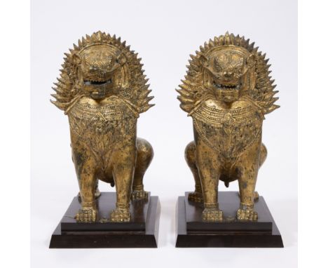 A pair of Thai temple guards in gilt bronzeEen paar Thaise tempelwachters in verguld brons60 x 39 x 30.5 cm