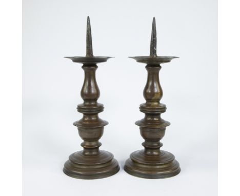 Pair of gothic bronze pin candlesticksKoppel gotische bronzen pinkandelaarsH 46.5 cm