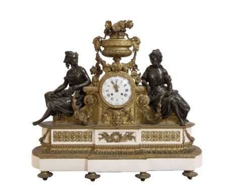 Impressive 19th century French bronze Louis XVI mantel clock with white marble base circa 1860, dial marked Rödel Fcant a Par