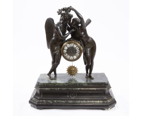 An impressive French patinated bronze mounted vert de mer marble Empire style mantel clock with Psyche crowning Cupid, 19th/2