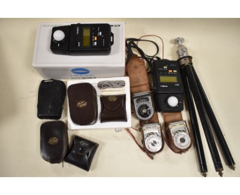 A box containing a selection of Light/ exposure meters and Invercones including Western Master V, Minolta, Sangama Weston, Si